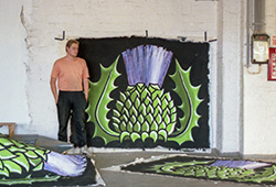 These thistles (9 in all) formed an arch for the backdrop of the show. They were painted on canvas then cut out and stuck to the arch.