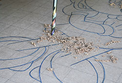 Drilling holes in the tight corners to make cutting easier.